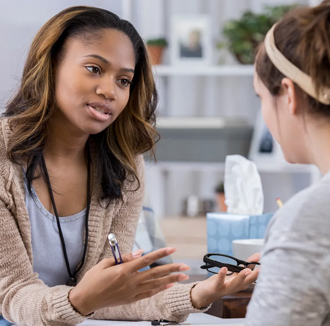 Public Health Nurse Talking with Patient